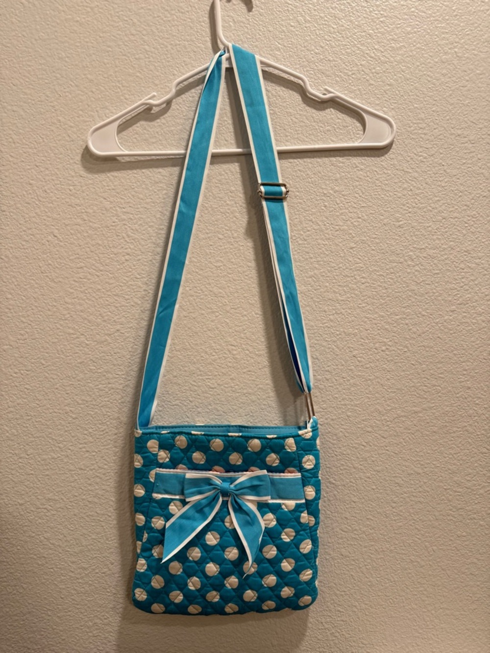 Turquoise Quilted Crossbody Bag with Bow Accent